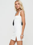 side view of model wearing Princess Polly Bombshell Mini Dress White Petite Square Neck 