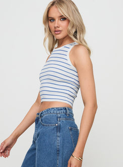 side view of model wearing Princess Polly Dupuis Top White / Blue Sleeveless Crew Neck 