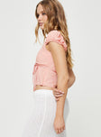 Crop top Cap sleeves, scooped neckline, tie fastening at back, invisible zip fastening Non-stretch, lined bust