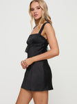 side view of model wearing Princess Polly Radioactive Bias Cut Mini Black Dress Square Neck 