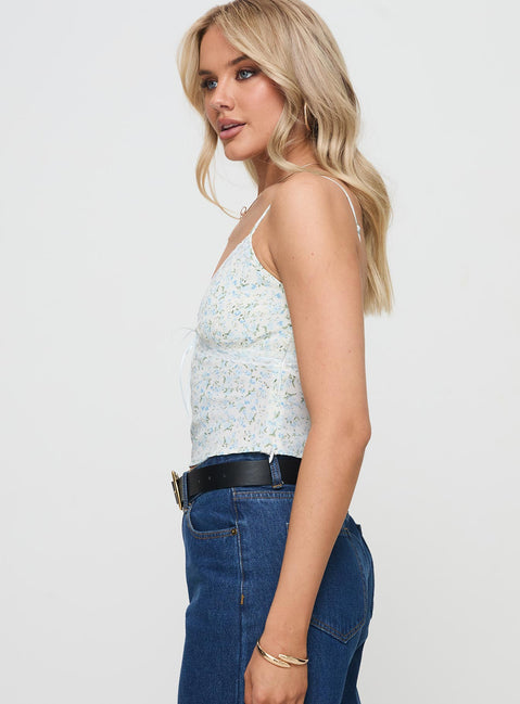 side view of model wearing Princess Polly Fondar Top Multi Floral Sleeveless Plunger 