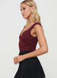 side view of model wearing Princess Polly Zenon Bodysuit Wine Sleeveless 