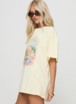 side view of model wearing Princess Polly Hotel Hawaii Oversized Tee Yellow Half Sleeves Crew Neck 