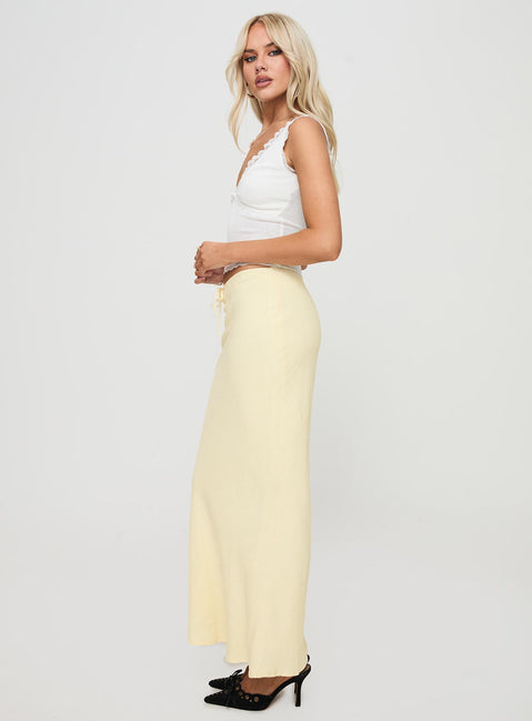   side view of model wearing Princess Polly Mercer Linen Blend Maxi Skirt Lemon Maxi 