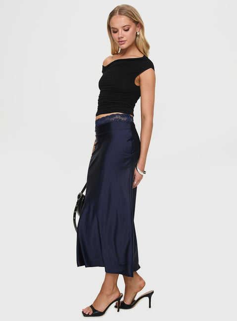   side view of model wearing Princess Polly The Charmaine Maxi Skirt Navy Midi Skirts 