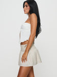   side view of model wearing Princess Polly Arroyo Mini Skirt Beige Mini Skirts 