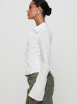 side view of model wearing Princess Polly Foxley Long Sleeve Top White Full Sleeves V-Neck 