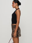   side view of model wearing Princess Polly Tejano Mini Skirt Leopard Mini Skirts 