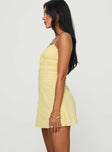 side view of model wearing Princess Polly Lucius Mini Dress Lemon Sweetheart Neckline 