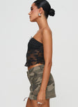 side view of model wearing Princess Polly Atheria Strapless Top Black Sleeveless straight 