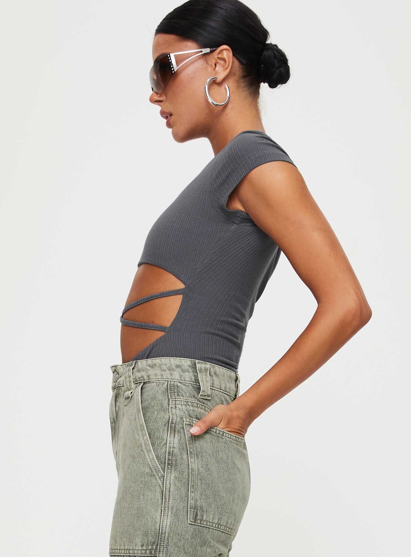 side view of model wearing Princess Polly Nicola Bodysuit Slate Short Sleeves Crew Neck 