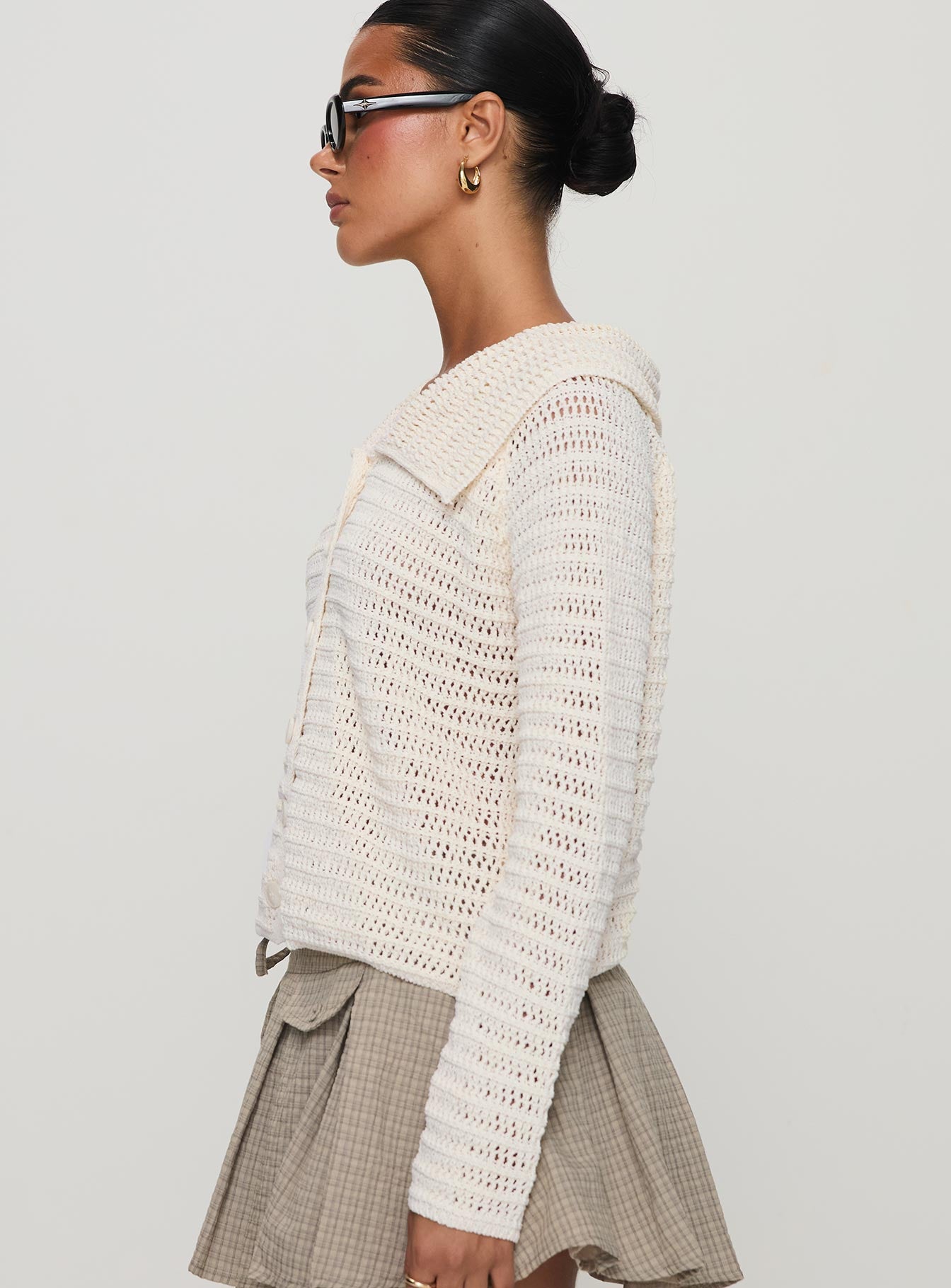 side view of model wearing Princess Polly Tuscon Crochet Sweater White cropped 