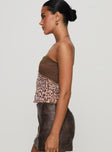 side view of model wearing Princess Polly Art Deco Top Brown Sleeveless straight 