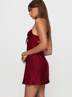 side view of model wearing Princess Polly Glendon Mini Dress Burgundy Sweetheart Neckline 
