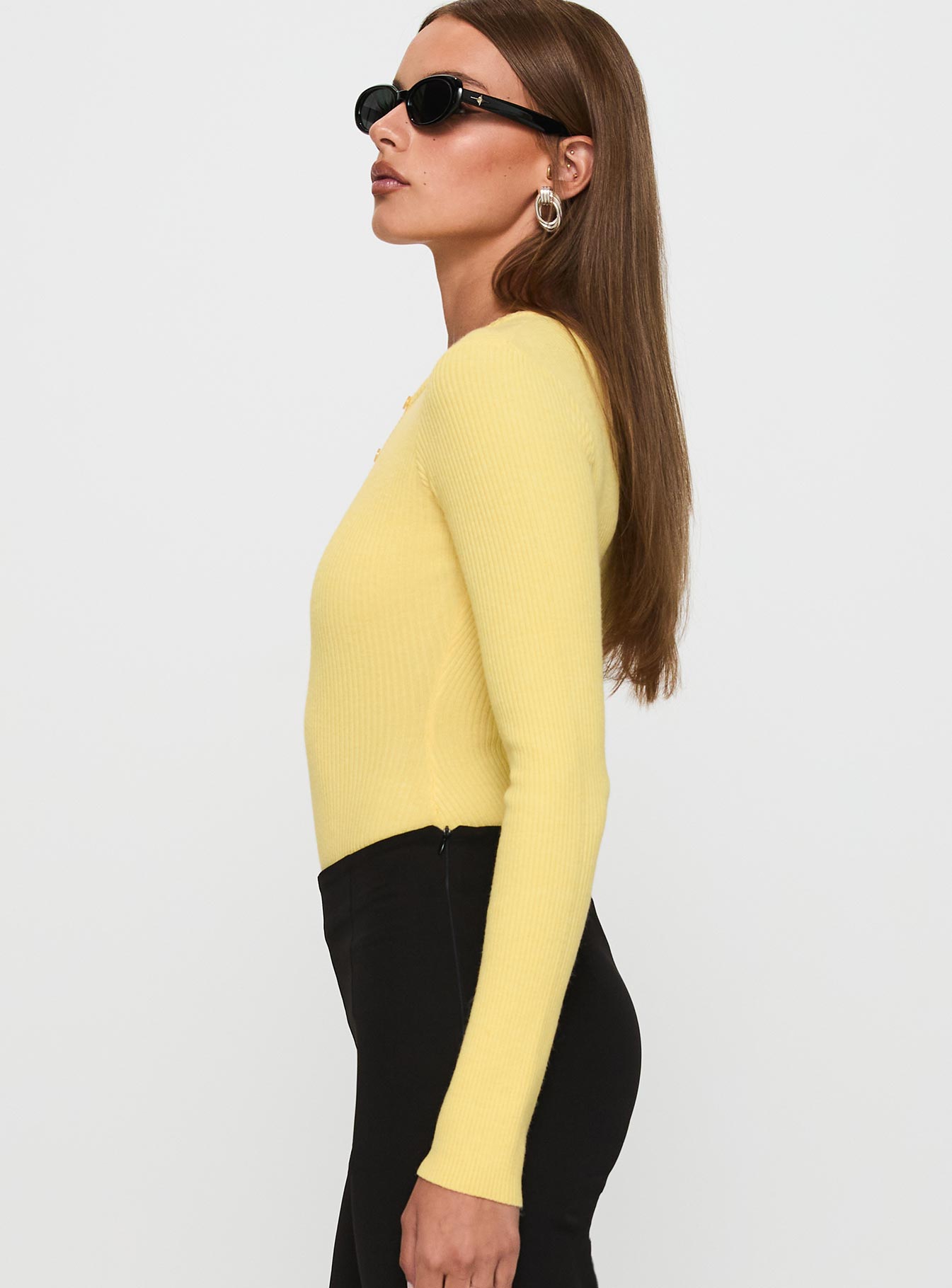 side view of model wearing Princess Polly Kerra Long Sleeve Bodysuit Lemon Full Sleeves 