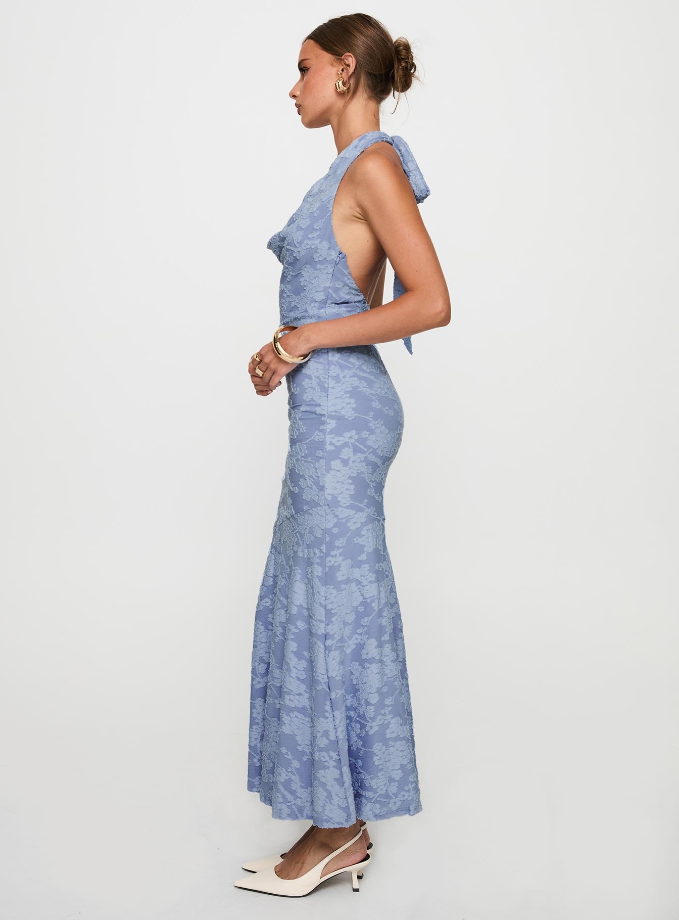 side view of model wearing Princess Polly Aymie Halter Maxi Dress Blue Cowl Neck 