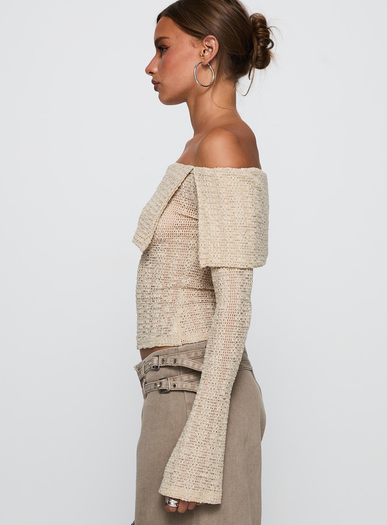 side view of model wearing Princess Polly Cardamom Long Sleeve Top Beige Full Sleeves straight 