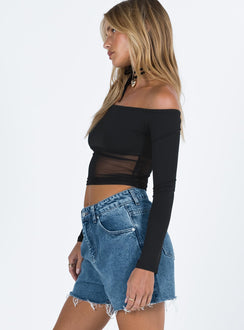 side view of model wearing Princess Polly Laurena Dark Denim Shorts Tall High Waisted Shorts 