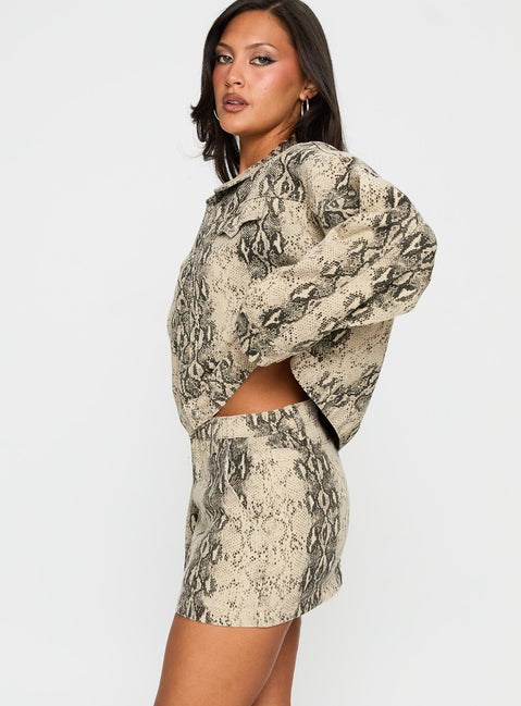   side view of model wearing Princess Polly Venom Mini Skirt Snake Mini Skirts 