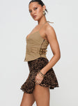   side view of model wearing Princess Polly Luned Mini Skirt Leopard Tall Mini Skirts 