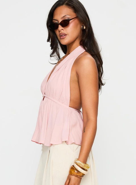 side view of model wearing Princess Polly Saddler Halter Top Pink Sleeveless Plunger 