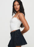 side view of model wearing Princess Polly Four You Top White Sleeveless Sweetheart 