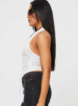 side view of model wearing Princess Polly Gratten Lace High Neck Top White Sleeveless High Neck 