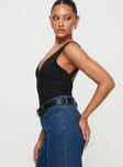 side view of model wearing Princess Polly Nellie Bodysuit Black Sleeveless Plunger 