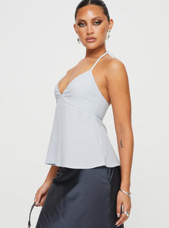 side view of model wearing Princess Polly Orwell Top Blue Sleeveless Plunger 