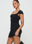 side view of model wearing Princess Polly Ravenna Mini Dress Black Scoop Neck 