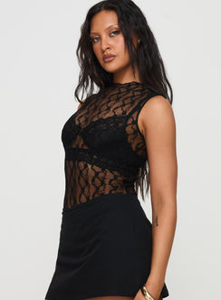 side view of model wearing Princess Polly Liedman Bodysuit Black Sleeveless Crew Neck 