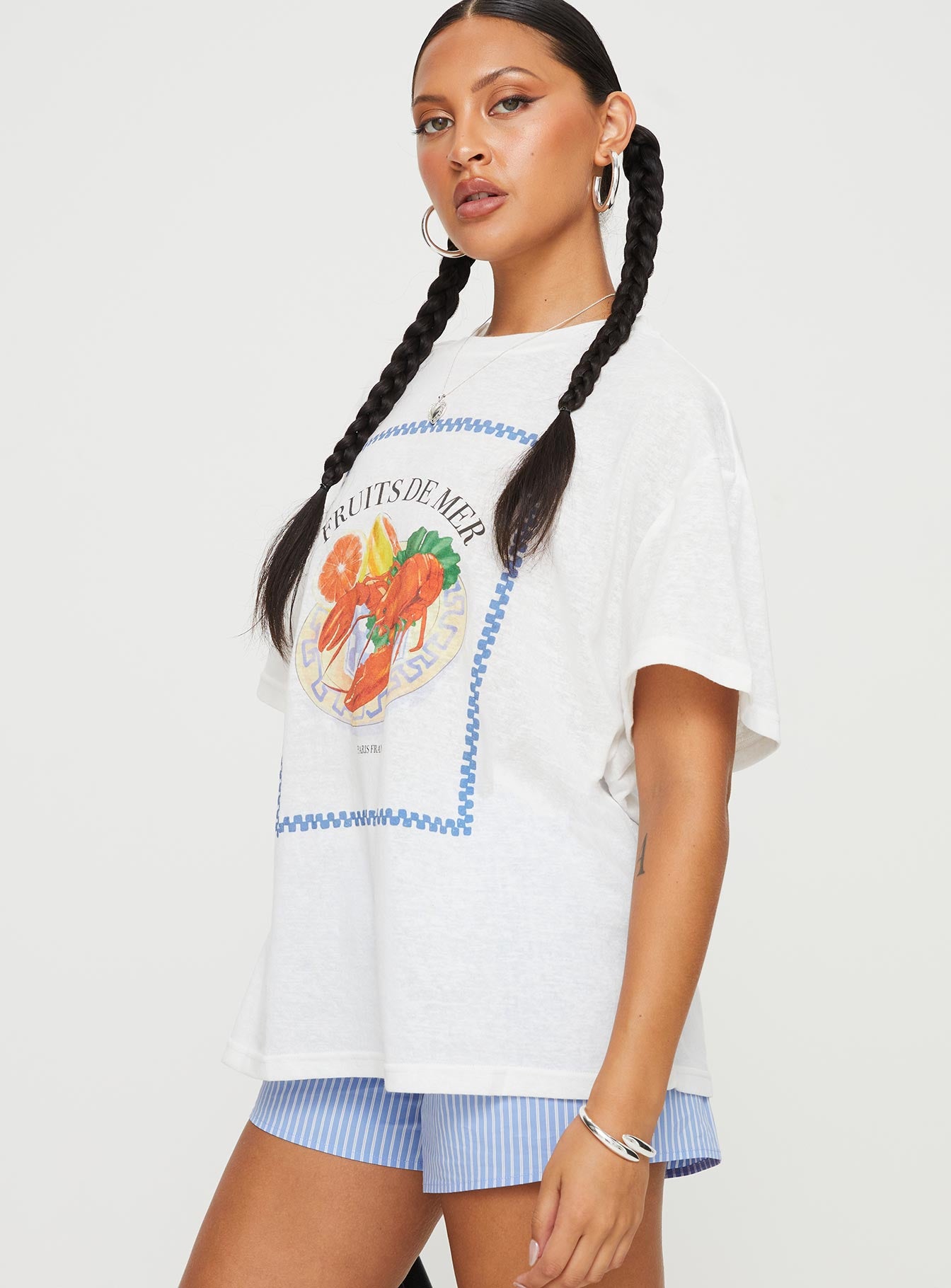 side view of model wearing Princess Polly Larry Lobster Oversized Tee White Half Sleeves Crew Neck 