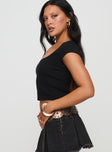 side view of model wearing Princess Polly Baseline Square Neck Rib Top Black Short Sleeves Square Neck 