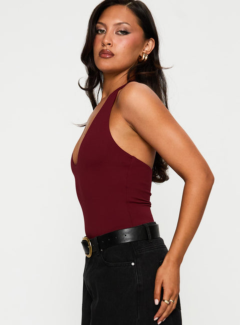 side view of model wearing Princess Polly Someone New Halter Bodysuit Burgundy Sleeveless 
