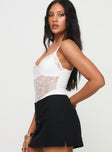 Bodysuit Adjustable shoulder straps, lace detailing, invisible zip fastening down back, cheeky style bottom, press clip fastening Good stretch, partially lined