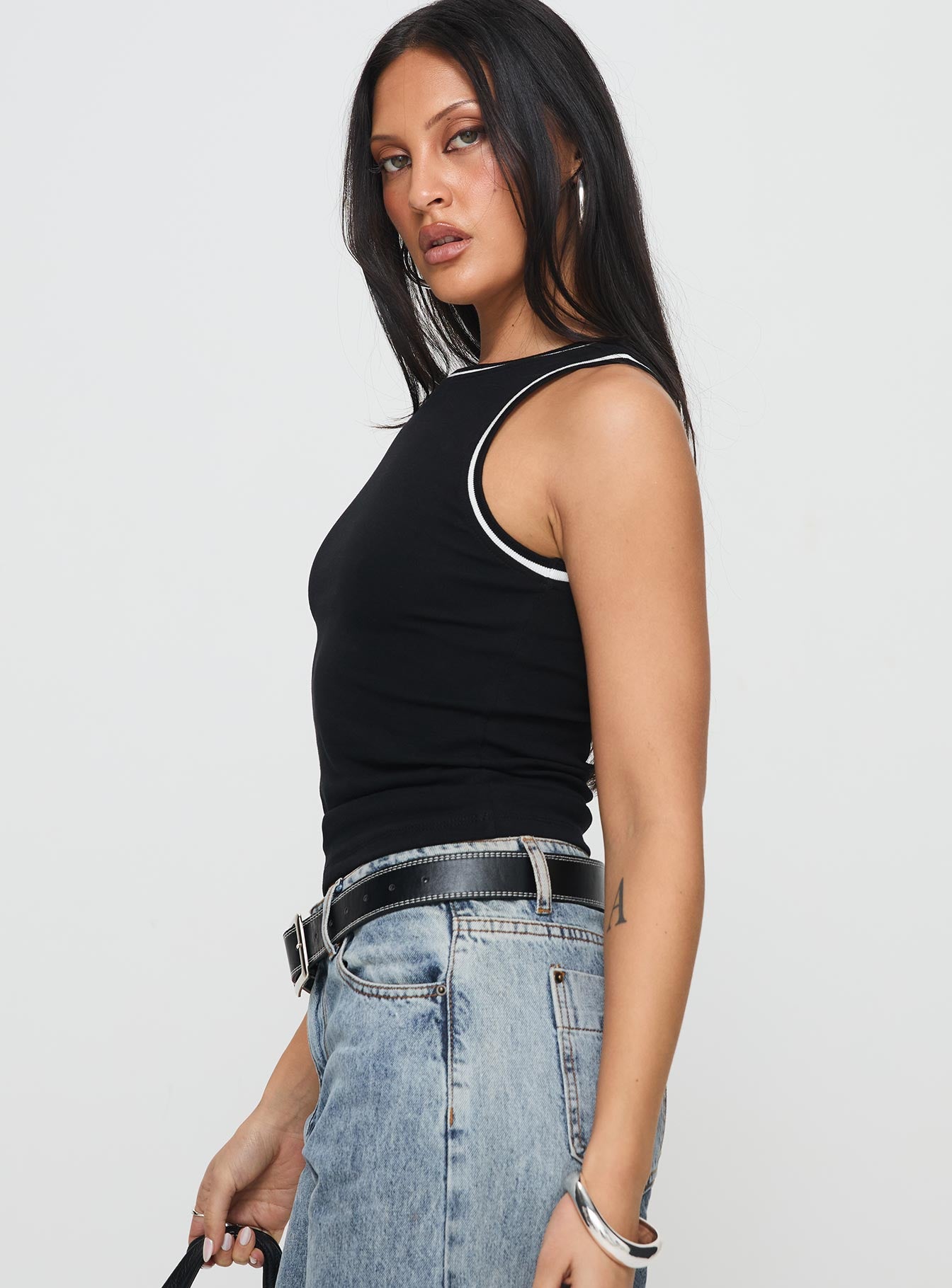 side view of model wearing Princess Polly Dazzling Tank Top Black Sleeveless Crew Neck 