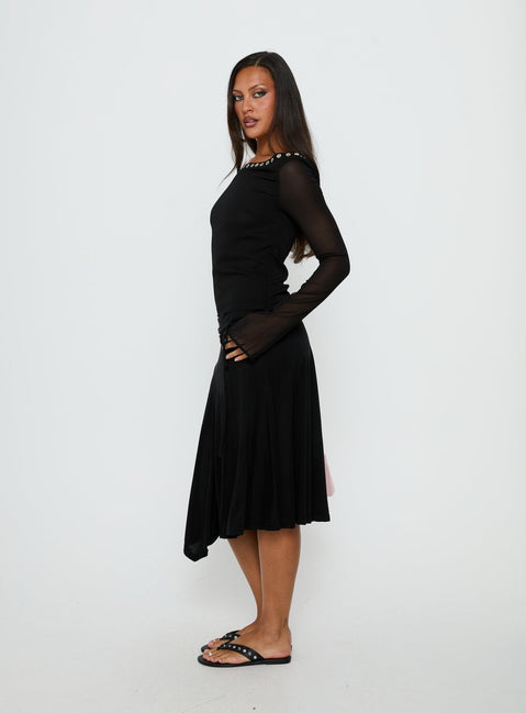   side view of model wearing Princess Polly Joaney Tie Side Jersey Midi Skirt Black Midi Skirts 