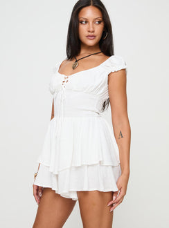 White Romper Cap sleeves, cross over tie fastening at bust, elasticated waist, layered hem