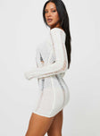 side view of model wearing Princess Polly Regie Long Sleeve Mini Dress White Boat Neck 