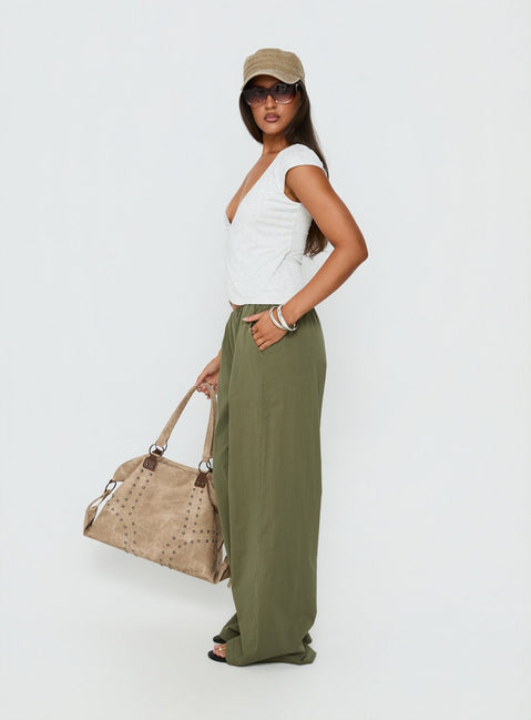 side view of model wearing Princess Polly Lunea Concealed Waistband Pants Khaki Low Rise Pants 