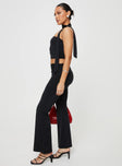 Matching set Crop top, elasticated band at bust, attached neck tie Low rise pants, thick elasticated waistband, ruching details at side Good stretch, partially lined