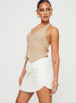   side view of model wearing Princess Polly Ogilvie Mini Skirt White Mini Skirts 