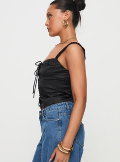 side view of model wearing Princess Polly Arvelin Corset Top Black Sleeveless Sweetheart 