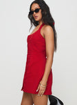 side view of model wearing Princess Polly Mallorie Halter Mini Dress Red Tall Scoop Neck 