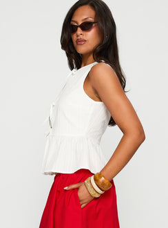 side view of model wearing Princess Polly Rosellah Tie Up Top White Sleeveless Crew Neck 