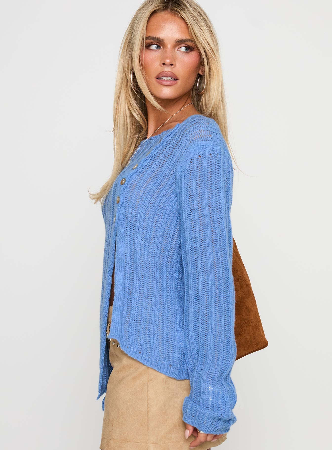 side view of model wearing Princess Polly Lenker Knit Jumper Blue Long 