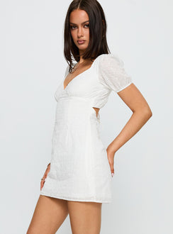 side view of model wearing Princess Polly Viella Broiderie Mini Dress White V-Neck 