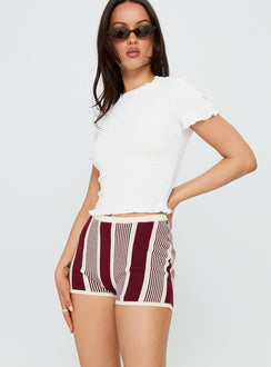 side view of model wearing Princess Polly Annisten Knit Shorts Red / Cream Stripe High Waisted Shorts 