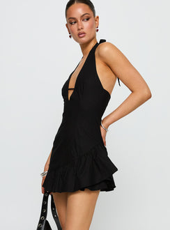 side view of model wearing Princess Polly Solistaire Halter Mini Dress Black Plunger 