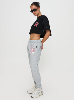 side view of model wearing Princess Polly Harvard Sweatpants Grey 